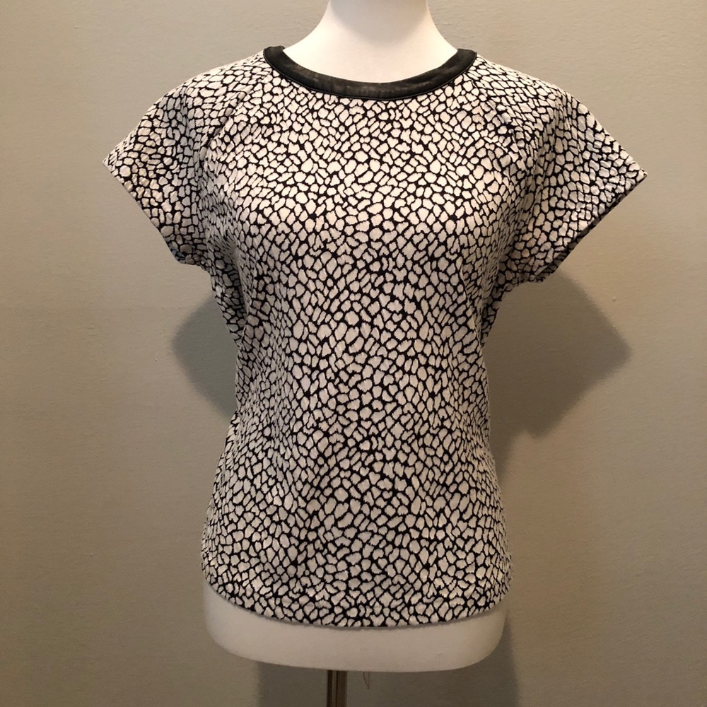 Leather trim, animal print top